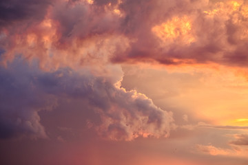 Naklejka na ściany i meble Evening sky with clouds during sunset
