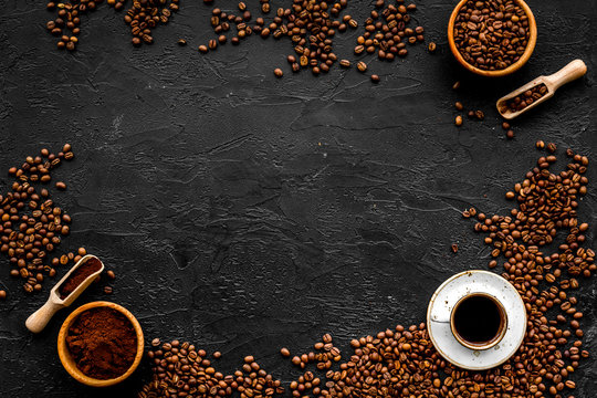 Coffee concept. Roasted beans, ground coffee, cup of espresso on black background top view copyspace © 9dreamstudio