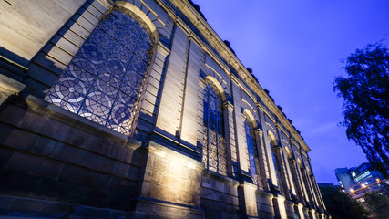 Night shot of side of a church