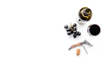 Open the wine. Corkscrew near bottle, glass, grape on white background top view copyspace