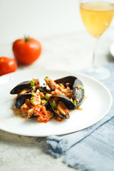 lunch with seafood: mussels with tomatoes