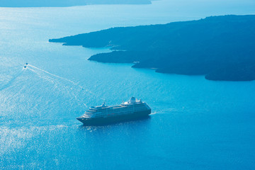 Cruise ship seen from the famous Santorini island in Greece