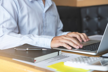 Fototapeta premium Businessman working new start up project plan and business strategy with laptop computer in office