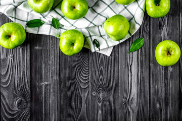 Fototapeta na wymiar fitness food with green apples on dark background top view mocku