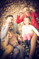 Obraz na płótnie Canvas Happy family spending time together. Autumn season.