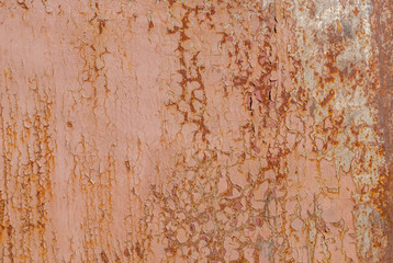 surface of rusty iron with remnants of old paint, chipped paint, beige texture, background