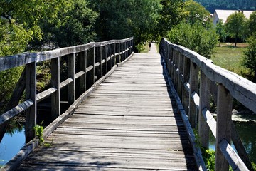 Obraz premium Bridge over the Krka river in Kostanjevica na Krki