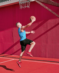 man on the street plays basketball