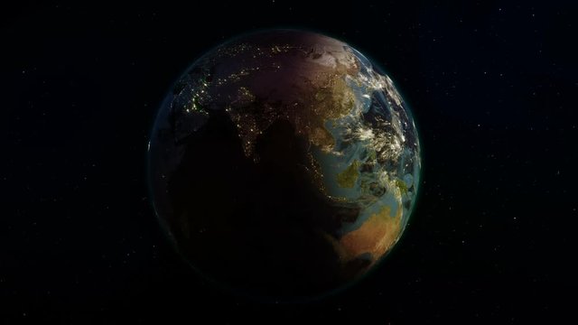 Realistic Earth rotating in space (loop). On the planet Earth is visible the change of day and night