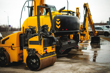 Excavator Loader Machine. Side View of Front Hoe Loader. Industrial Vehicle. Heavy Equipment Machine. Pneumatic Truck. Construction Equipment