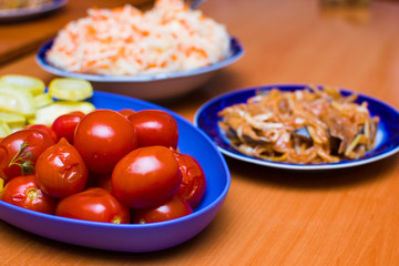 canned tomatoes and zucchini on a plate