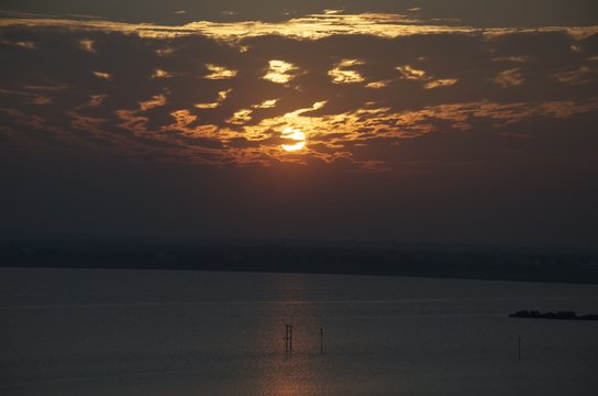 Sunset Between Clouds At Osman Sagar Hyderabad