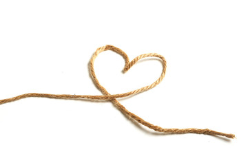 Top view of a rope in a heart shape isolated on white background.