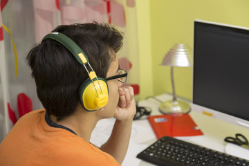 boy in front of the computer screen