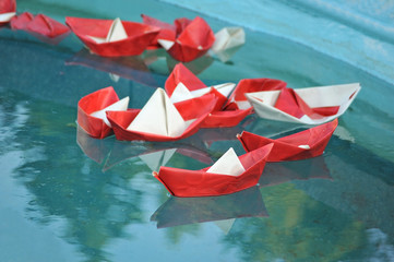 Paper ship in water