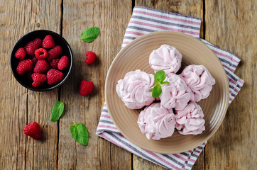 Raspberry Zephyr on a plate with fresh raspberries and mint