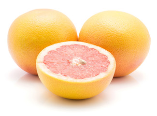Red grapefruits isolated on white background two whole one half.