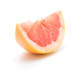 Fototapeta na wymiar One red grapefruit slice isolated on white background.