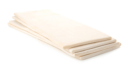 Fresh raw puff dough, isolated on white