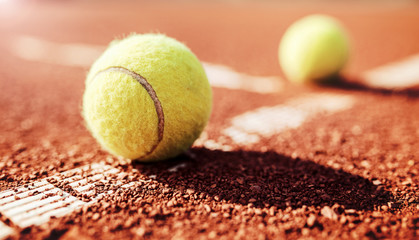 Tennis ball on the tennis court. Sport, recreation concept