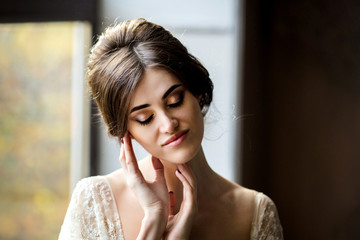 Wedding fashion bride with bouquet in hands