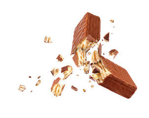Chocolate waffle broken into two parts isolated on white background