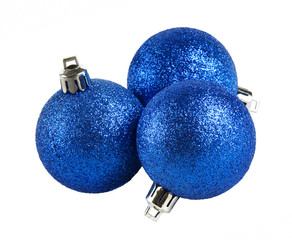 Blue christmas balls on white background.