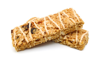 Oatmeal, almond and honey cereal bar isolated on white background