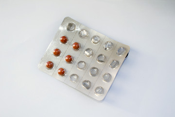 Packing with red tablets