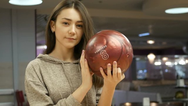 Portrait of a girl with a ball