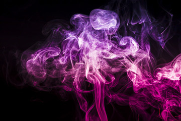 Colored smoke on black background