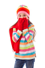 Smiling girl in warm winter clothes