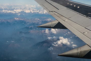 Obraz premium plane, blue, sky, nature, cloud, flight, horizon, window, beautiful, air, airplane, aircraft, white, light, glass, wing, outdoor, top, fly, high, earth, frame, view, cloudscape, travel, transport, bus
