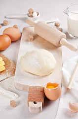 Dough preparation recipe for bread, pizza, pasta, cookies or pie ingridients, food flat lay on kitchen table background. Working with butter, milk, yeast, flour, eggs, sugar pastry or bakery cooking.