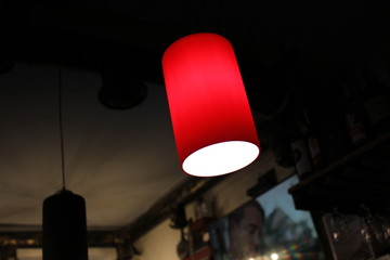 Red lamp in the darkness