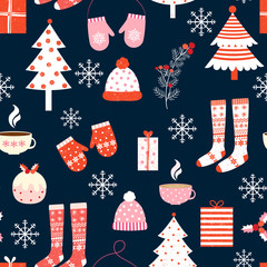 Cute seamless pattern with winter and Christmas clothes, trees and snowflakes on dark blue background