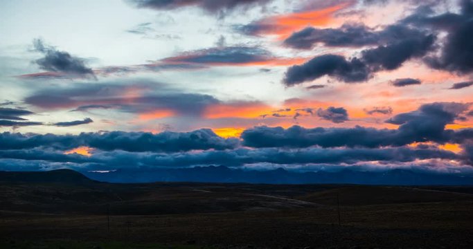 NEW ZEALAND – MARCH 2016 : Timelapse during beautiful sunset with amazing clouds and landscape in view