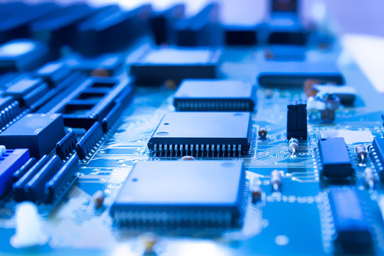 Printed circuit board with microprocessor in blue