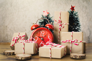 Paper gift box with pine tree accessory , Merry Christmas and Happy New year concept,selective and soft focus