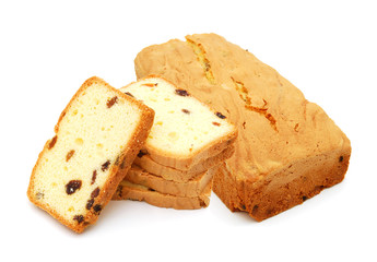 Cake with raisins and slice on white