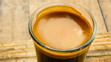 Froth texture on a cup of fresh coffee