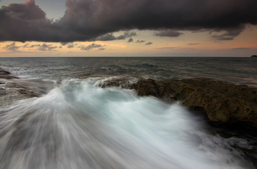 Dramatic waves at sunset in Kudat, Sabah, Borneo, East Malaysia