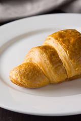 croissant on white plate