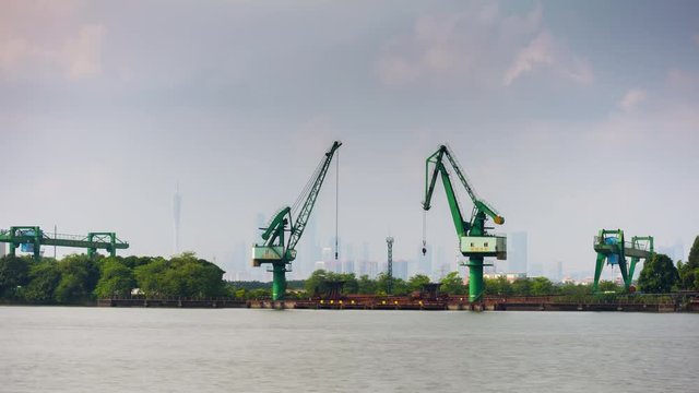 day light guangzhou industrial cranes river downtown panorama 4k timelapse china
