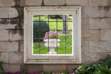 Fototapeta na wymiar Flowerpot frames on the stone white wall / white wall background