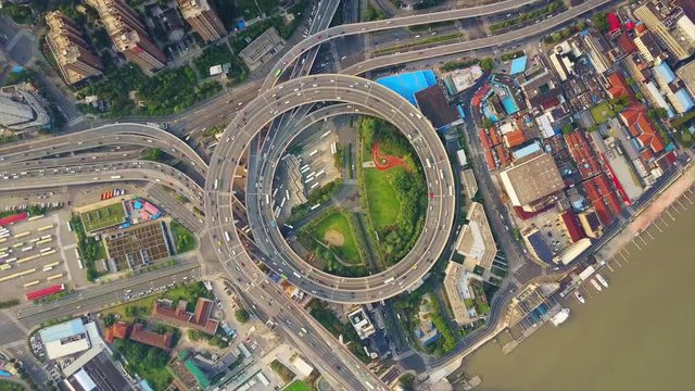 sunny day shanghai city famous traffic round road junction aerial top view 4k china
