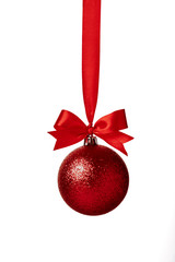 Red christmas ball with red bow over white