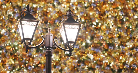 Christmas tree decoration and street lamp