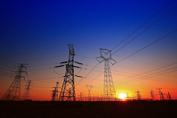 Sunset silhouette of pylon