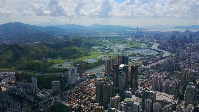 shenzhen cityscape sunny day hong kong border river aerial panorama 4k china
